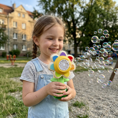 Kiwający się kwiatek puszczający bańki